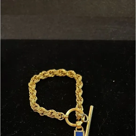Gold Tone Bracelet with Toggle Closure and cross charm. WA402 - Picture 2 of 4